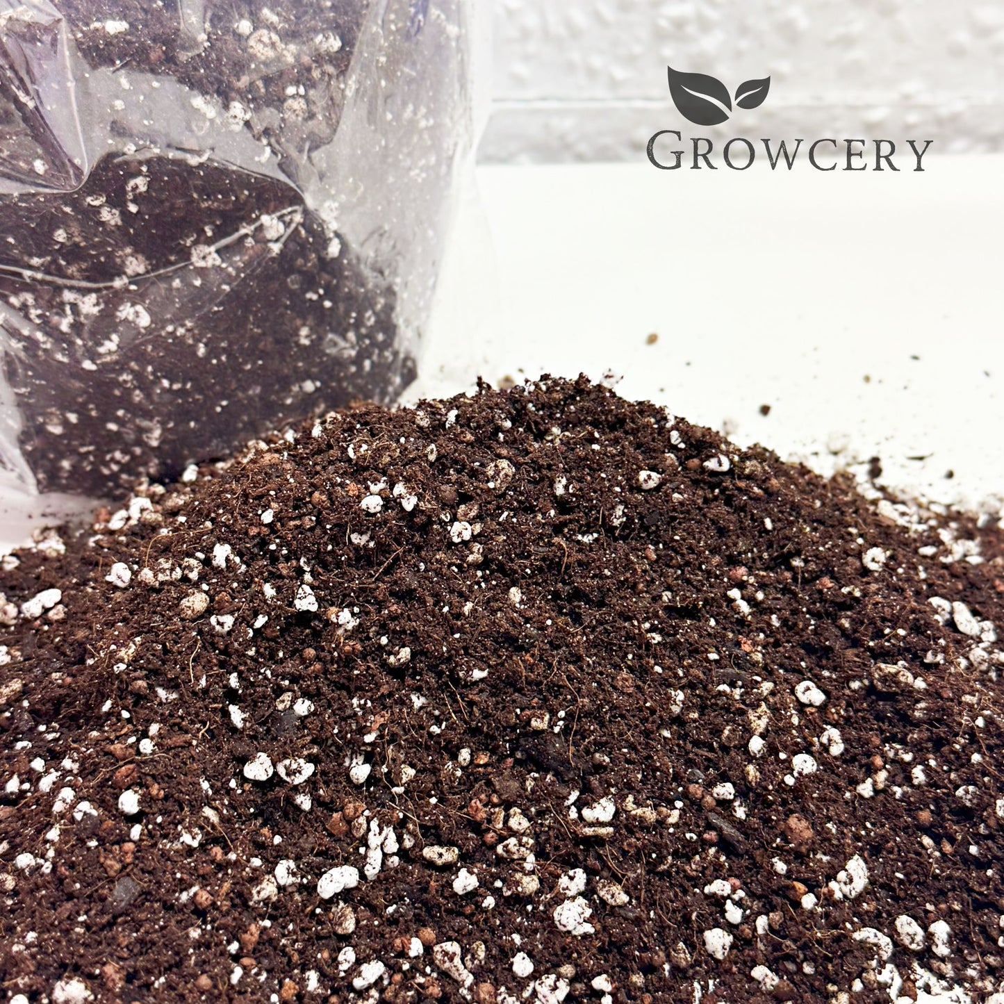 Close-up of bonsai potting mix with activated biochar and perlite, designed for healthy root development and excellent drainage