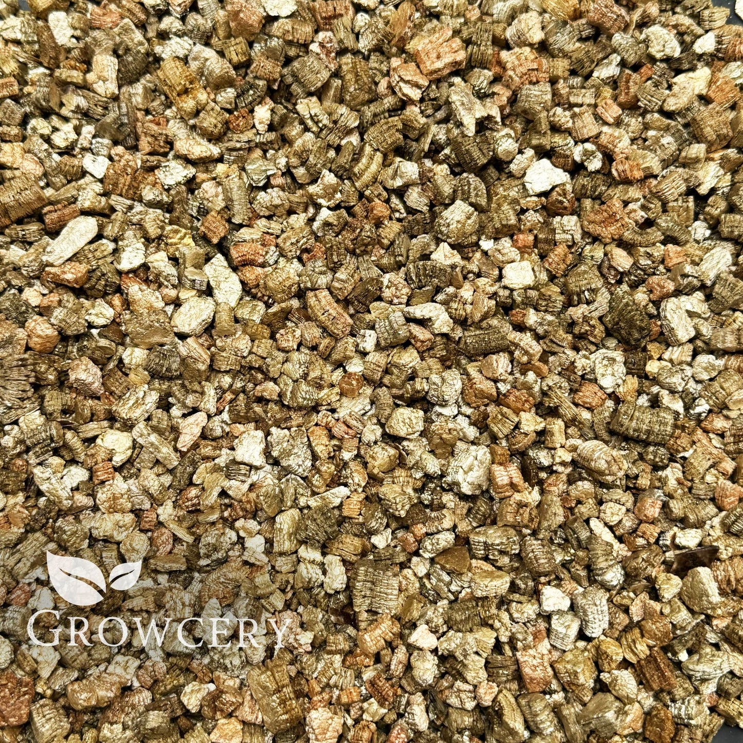 Top view of coarse vermiculite in bulk, perfect for improving aeration in potting medium
