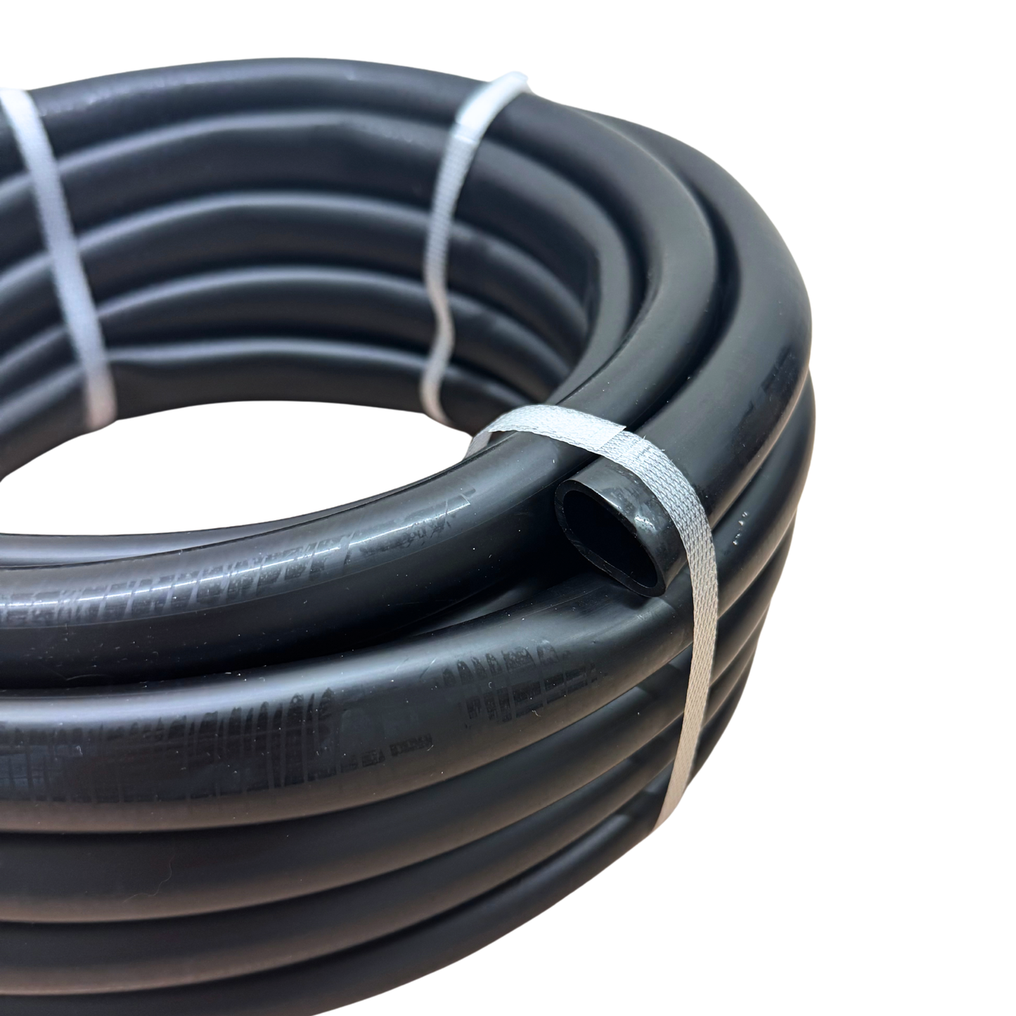 19mm flexible garden irrigation pipe close-up showing thick wall tubing and bundled roll