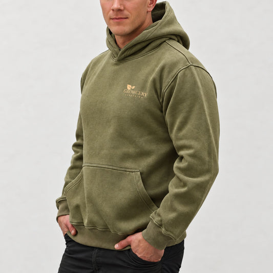 Gardening Hoodie, Oversized – Olive Green, Rooted in Nature, worn by a man, perfect for outdoor activities.