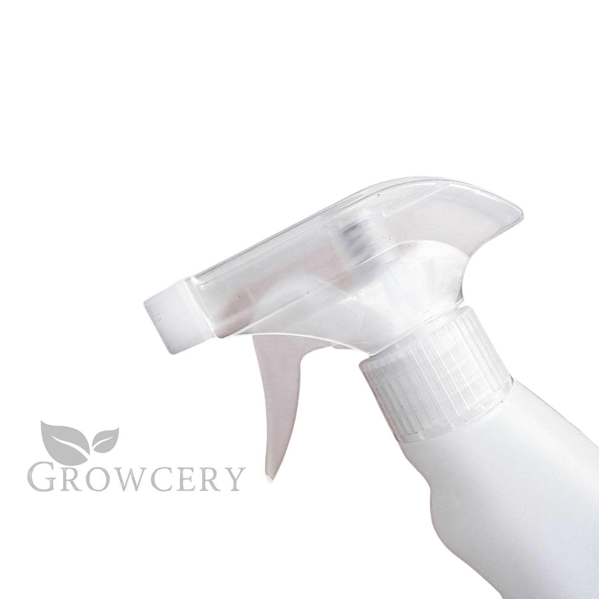 Top-view close-up of clear plastic spray head and cap on 750 ml plant mister