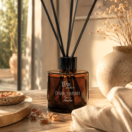 Reed diffuser in amber glass bottle with black reeds