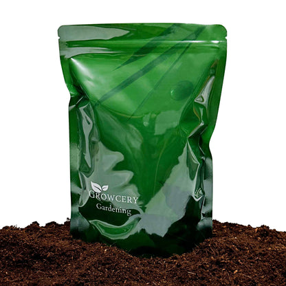 Green Growcery Gardening stand-up pouch displayed on a bed of coco coir against a white background.