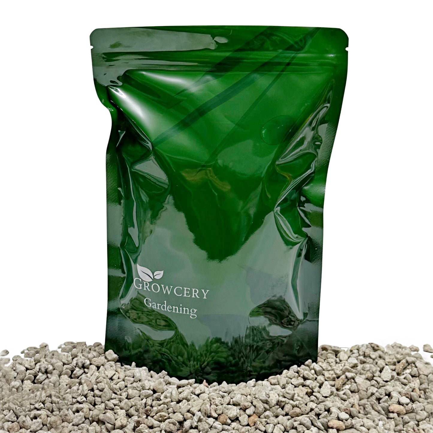 Green Growcery Gardening stand-up pouch displayed on a bed of volcanic pumice stones against a white background.
