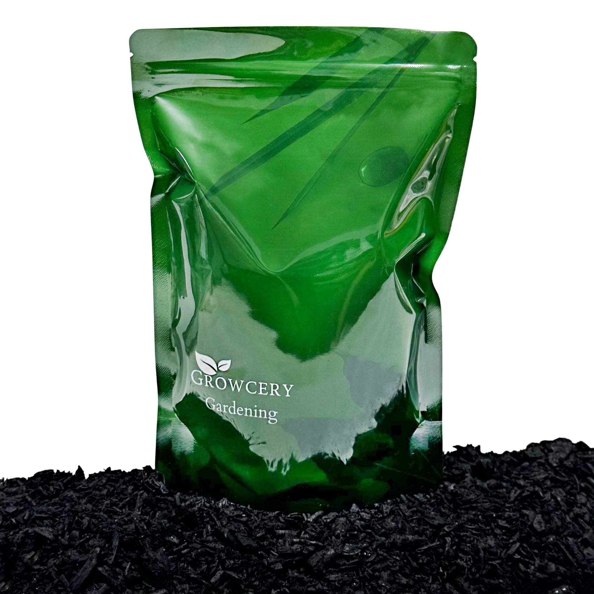 Green Growcery Gardening stand-up pouch placed on activated biochar pieces against a white background.