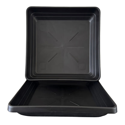 Top view of deep square plant saucers showing stackable design