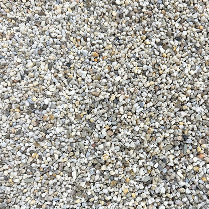 Natural 3–5mm aquarium gravel made from rounded quartz stones used as a fish tank substrate for freshwater aquariums and aqua scaping.