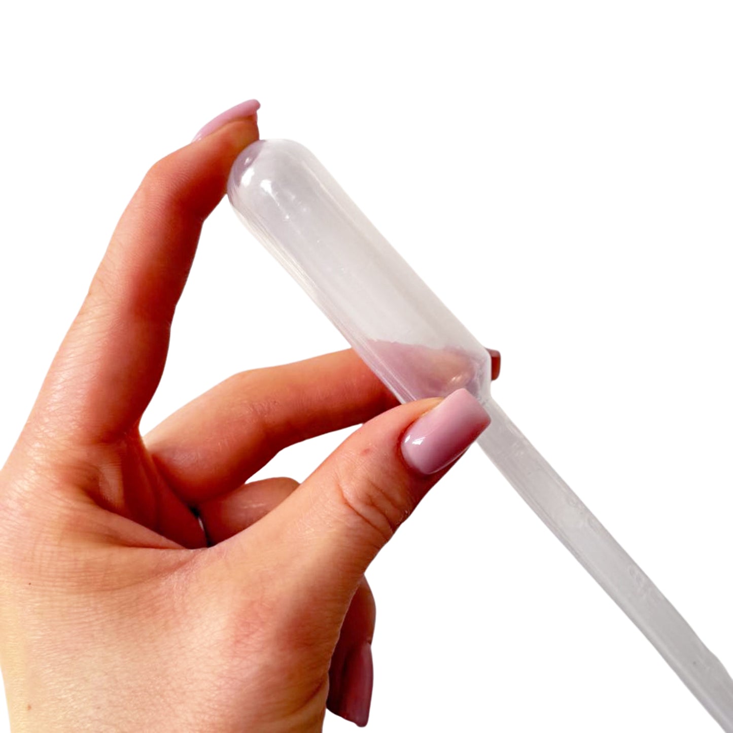Close-up of fine tapered tip on clear plastic dropper