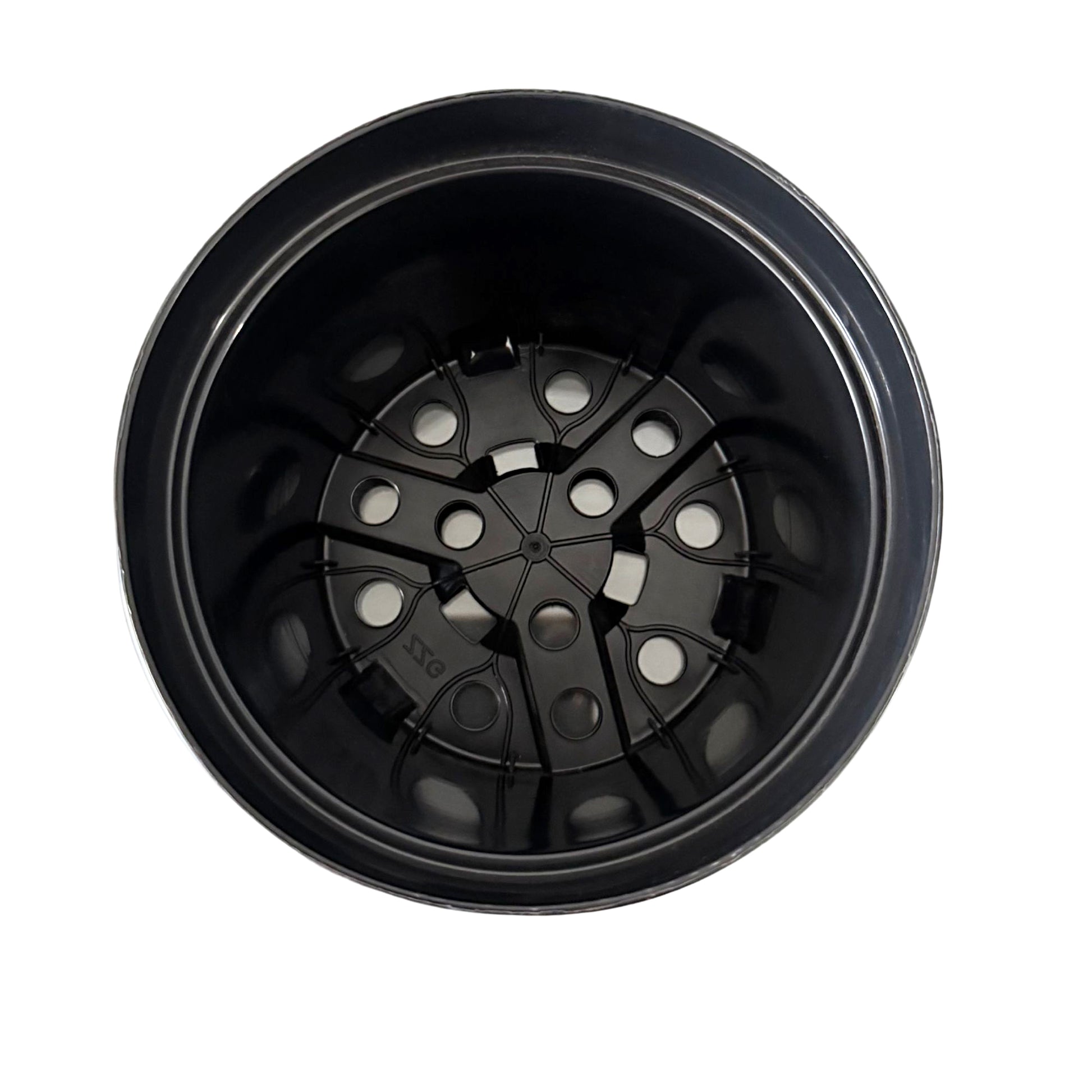 Top view of round nursery pot showing multiple drainage holes