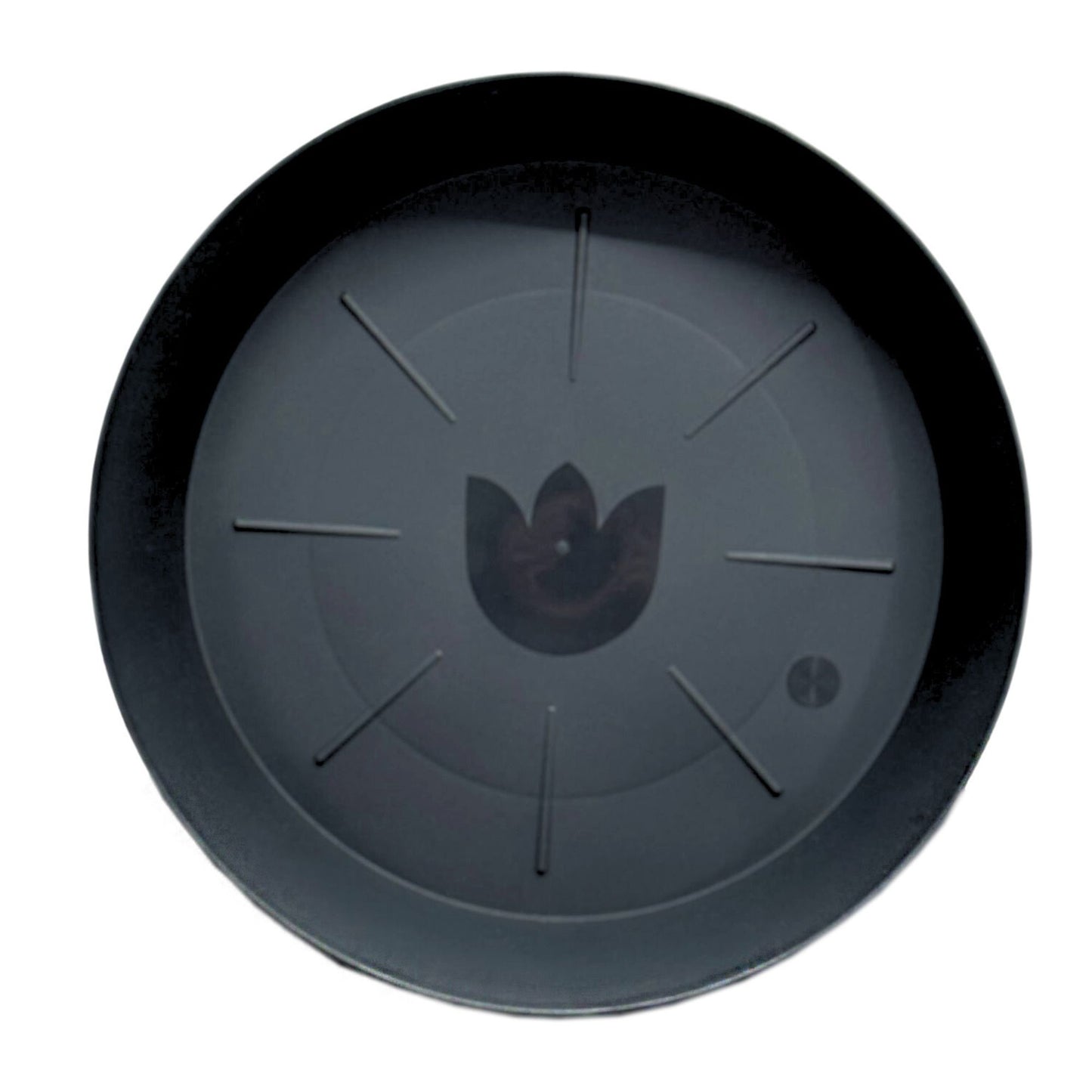 Top view of black plastic plant saucer with drainage lines